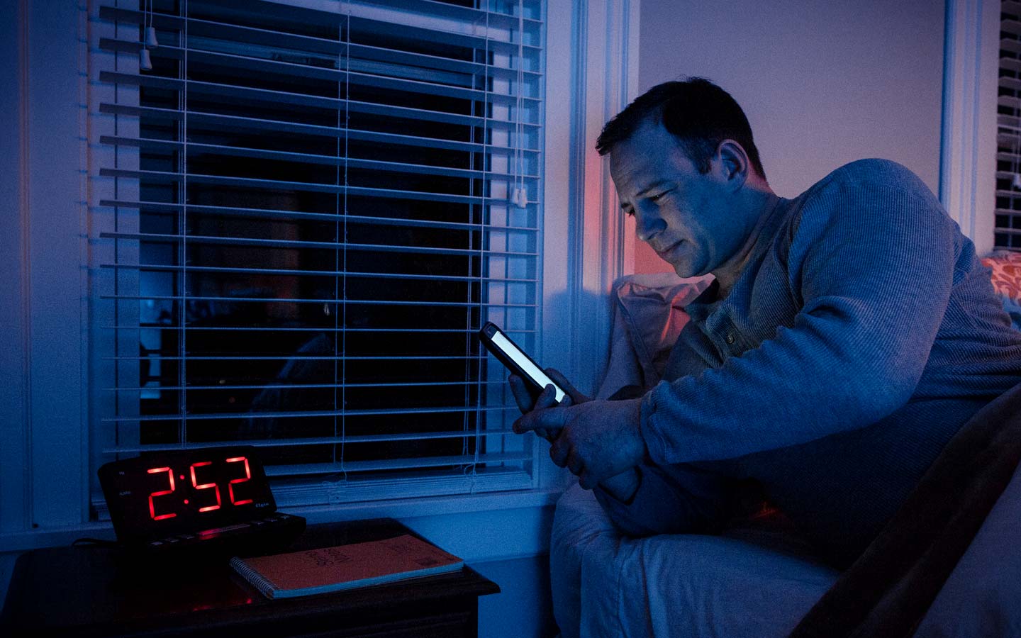 man on phone late at night